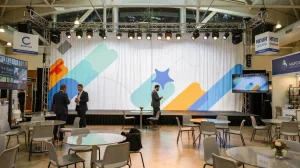 Why Do Corporate Events Favor Dye Sublimated Fabric Backdrops?